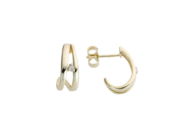 Haakonsen ørepynt i gull med diamanter.