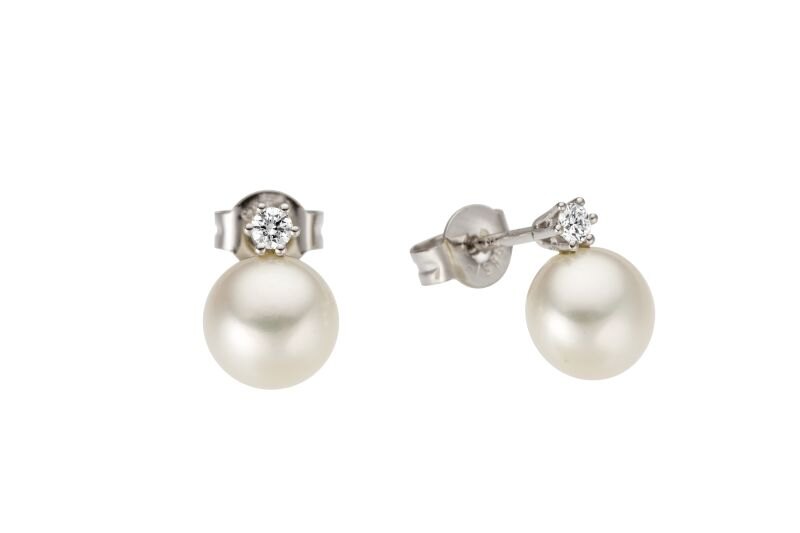 Haakonsen ørepynt i hvitt gull med perle og diamant.